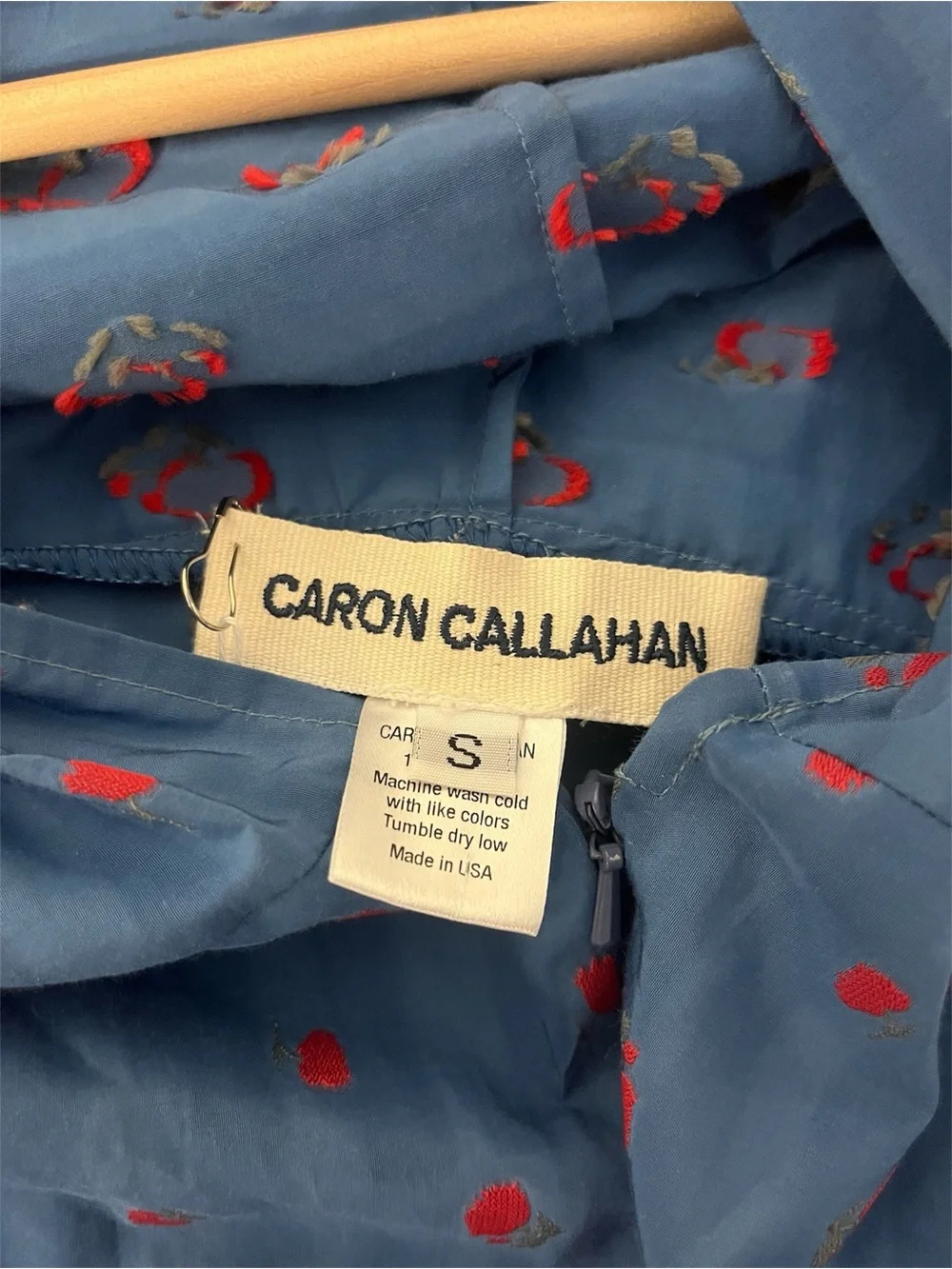 Caron Callahan Blue Short-Sleeve Kids Pajama Jumpsuit with Pink Dot Pattern